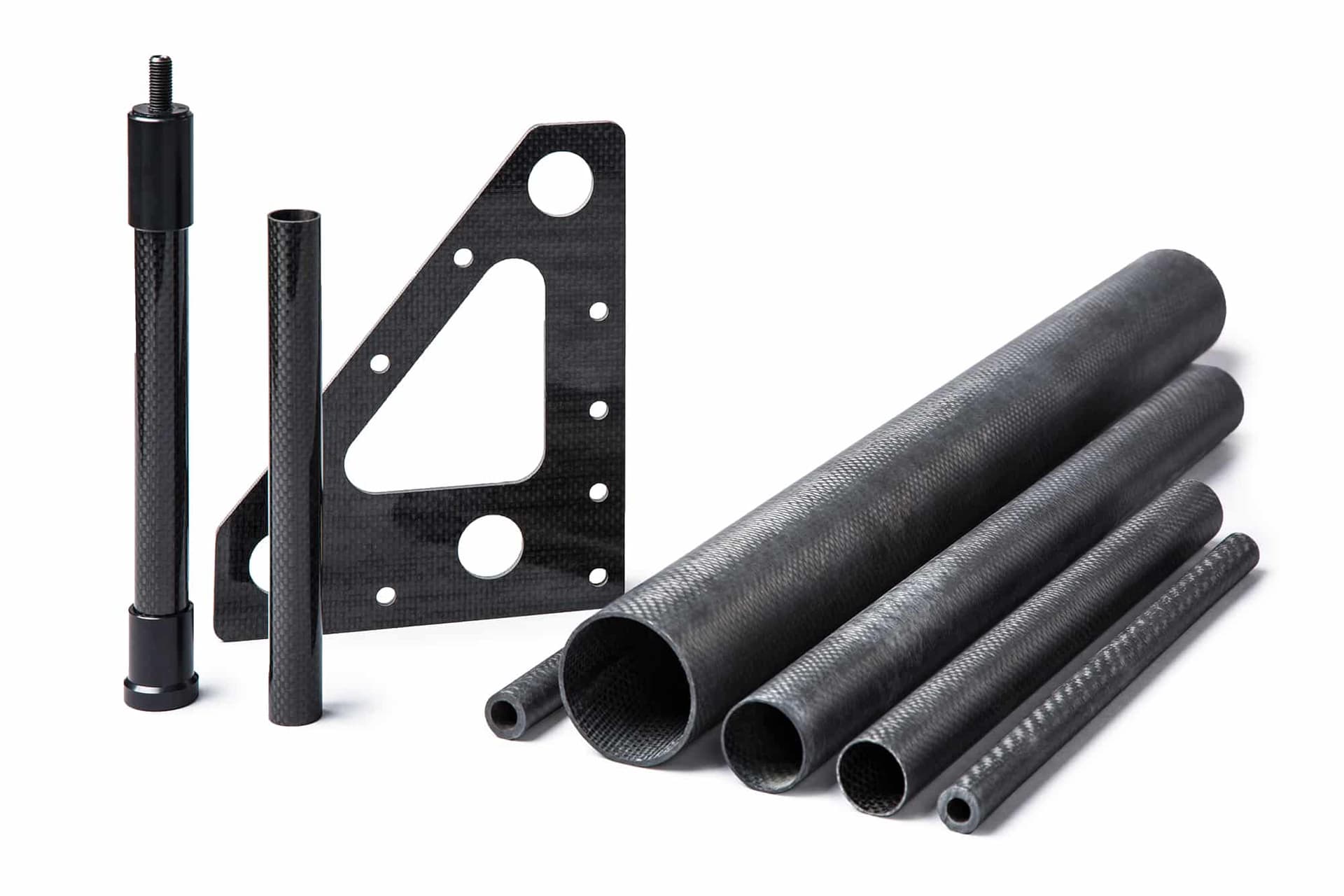 Roll-wrapped carbon fiber tubing
